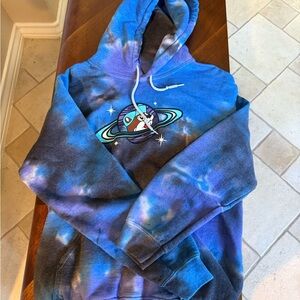 Vibrant Blue Tie-Dye Hoodie with Space Graphic